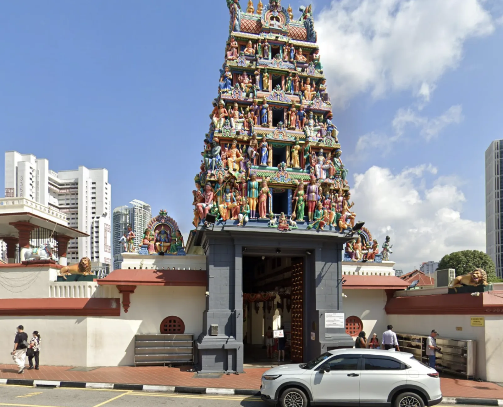 Colorful gopuram above the entrance to Sri Mariamman Temple